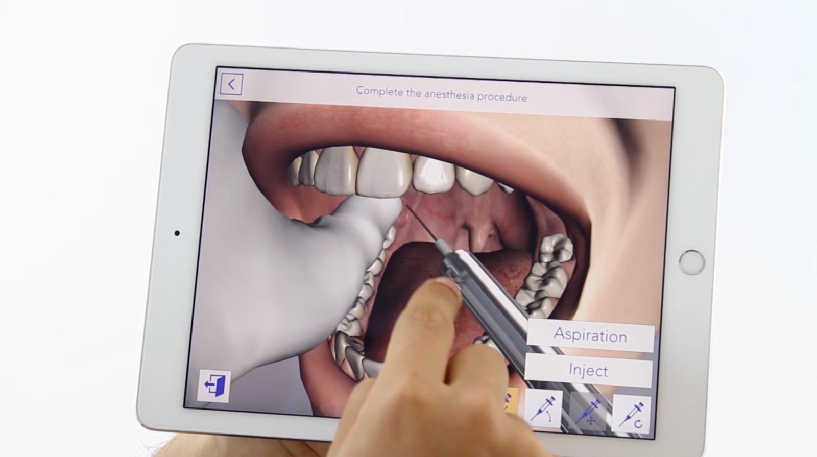 The Anestha app running on a tablet — a 3D view inside the mouth with a syringe positioned for an inferior alveolar nerve block, alongside Aspiration and Inject controls.